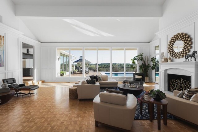 17 Cousteau Ln, Austin, TX 78746 - living room with a fireplace, a decorative wall, beam ceiling, and high vaulted ceiling