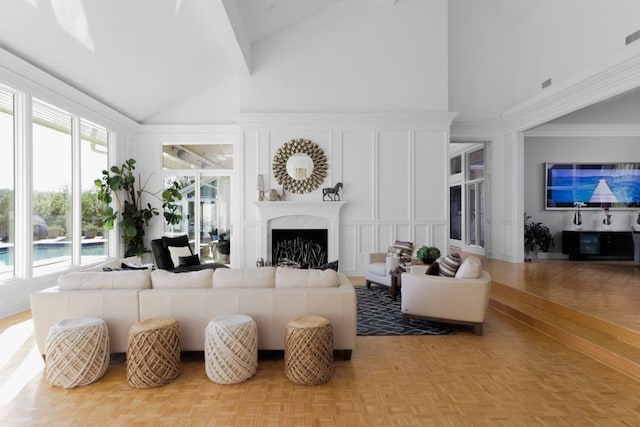 17 Cousteau Ln, Austin, TX 78746 - living area with high vaulted ceiling, a decorative wall, and a fireplace