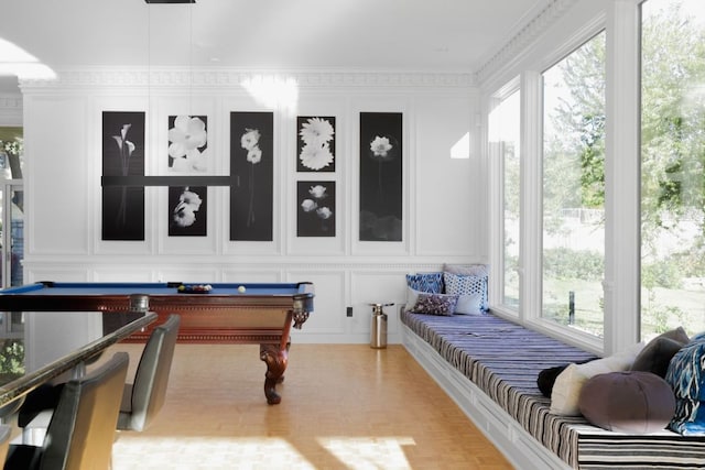 17 Cousteau Ln, Austin, TX 78746 - recreation room with a decorative wall, billiards, healthy amount of natural light, and light wood-type flooring