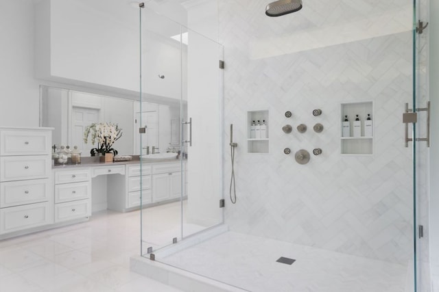 17 Cousteau Ln, Austin, TX 78746 - full bathroom featuring a marble finish shower and vanity