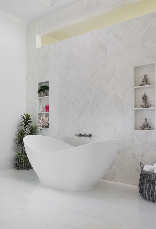 17 Cousteau Ln, Austin, TX 78746 - bathroom featuring a freestanding bath, crown molding, and tile patterned floors