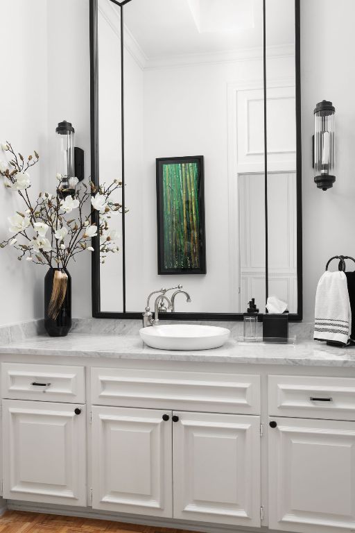 17 Cousteau Ln, Austin, TX 78746 - bathroom with vanity and ornamental molding