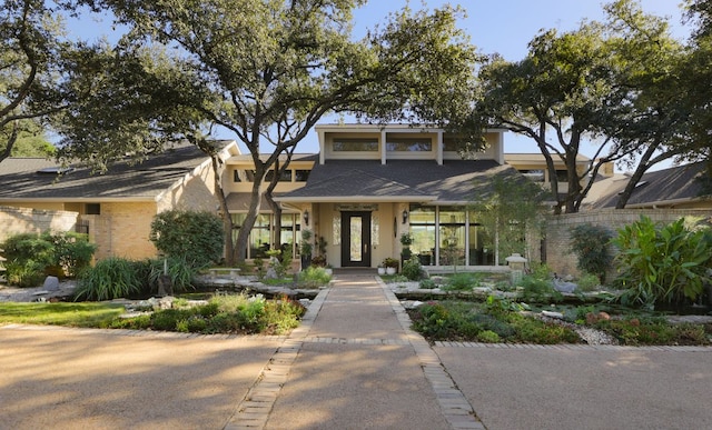 17 Cousteau Ln, Austin, TX 78746 - view of front of home with stucco siding