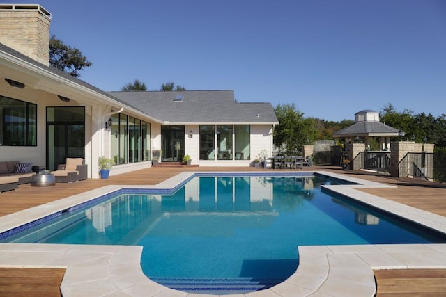 17 Cousteau Ln, Austin, TX 78746 - swimming pool featuring a wooden deck and a gazebo