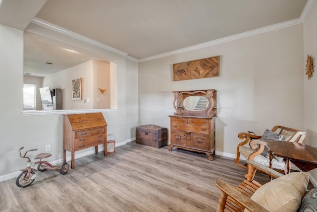 2209 Callaway Garden Ct, Pflugerville, TX 78660 - sitting room featuring wood finished floors, crown molding, and baseboards