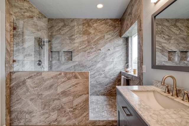 2209 Callaway Garden Ct, Pflugerville, TX 78660 - full bathroom featuring vanity and a walk in shower