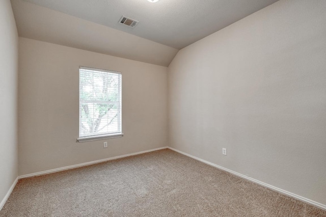 2209 Callaway Garden Ct, Pflugerville, TX 78660 - carpeted spare room featuring lofted ceiling and baseboards