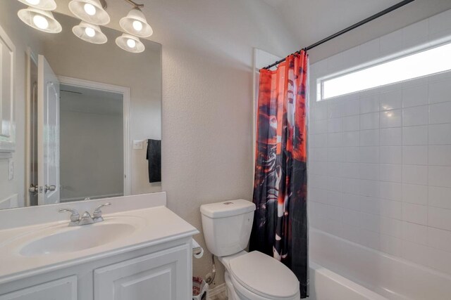 2209 Callaway Garden Ct, Pflugerville, TX 78660 - full bathroom with toilet, vanity, and shower / bathtub combination with curtain