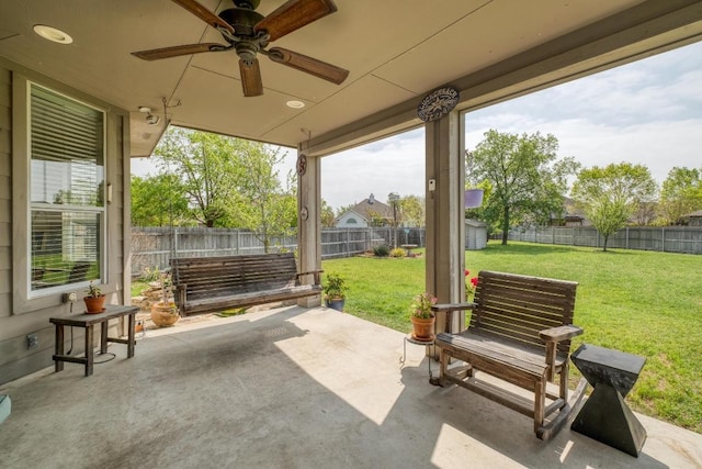 2209 Callaway Garden Ct, Pflugerville, TX 78660 - fenced backyard with ceiling fan and a patio