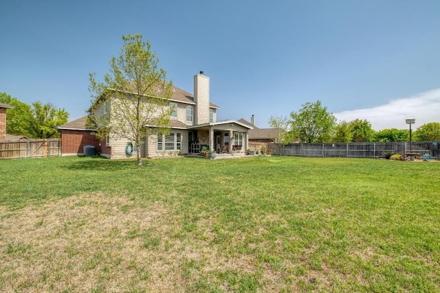 2209 Callaway Garden Ct, Pflugerville, TX 78660 - back of property with cooling unit, a chimney, and a patio