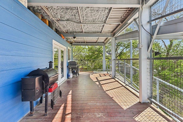 deck featuring french doors and area for grilling