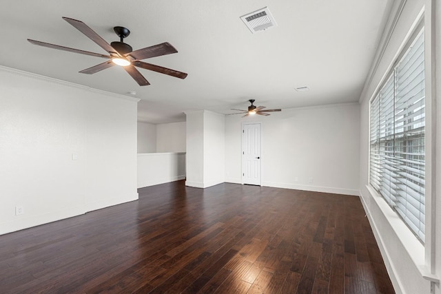 1290 Sweet Gum Dr, Kyle, TX 78640 - empty room featuring a ceiling fan, wood finished floors, baseboards, and crown molding