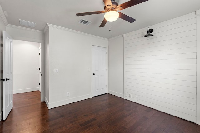 1290 Sweet Gum Dr, Kyle, TX 78640 - unfurnished bedroom with dark wood-style flooring, crown molding, baseboards, a closet, and a ceiling fan