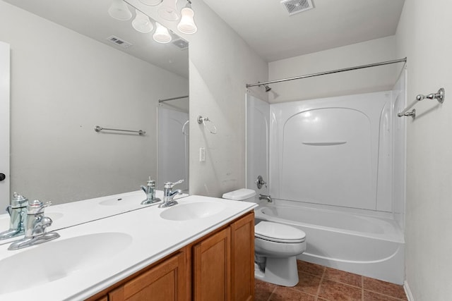 1290 Sweet Gum Dr, Kyle, TX 78640 - full bath with toilet, tub / shower combination, double vanity, and tile patterned floors