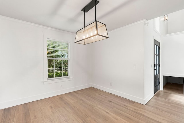 1290 Sweet Gum Dr, Kyle, TX 78640 - spare room with light wood-style flooring, ornamental molding, and baseboards