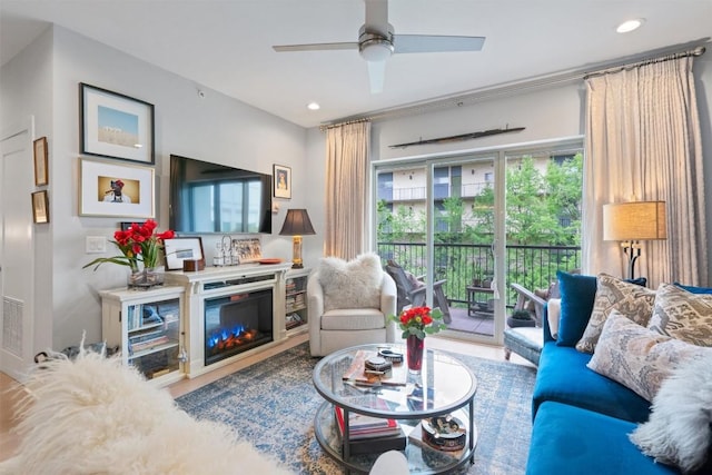 908 Nueces St Unit 36, Austin, TX 78701 - living room featuring ceiling fan, recessed lighting, and wood finished floors