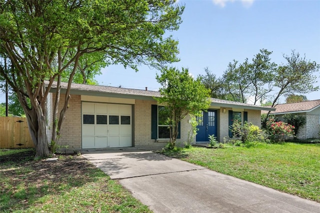 8313 Renton Dr, Austin, TX 78757 - ranch-style home with brick siding, an attached garage, fence, and a front yard