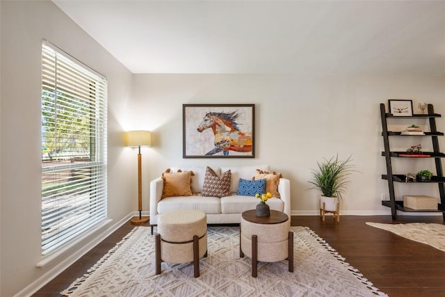 8313 Renton Dr, Austin, TX 78757 - living area with baseboards and wood finished floors