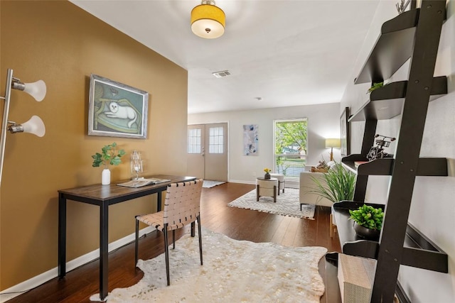 8313 Renton Dr, Austin, TX 78757 - foyer entrance featuring wood-type flooring, baseboards, and visible vents