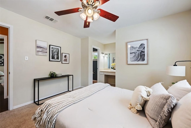 8313 Renton Dr, Austin, TX 78757 - bedroom featuring a ceiling fan, visible vents, carpet floors, baseboards, and ensuite bathroom