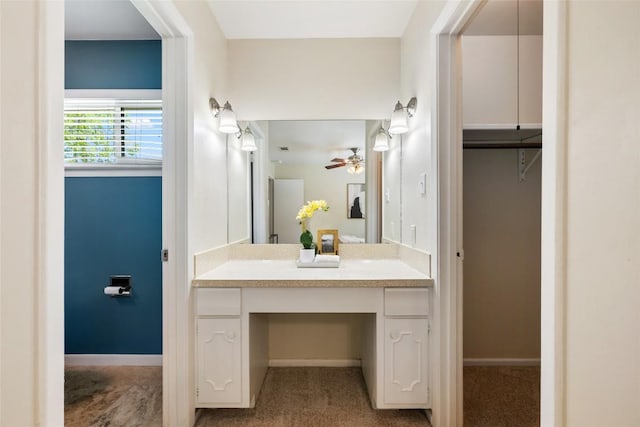 8313 Renton Dr, Austin, TX 78757 - bathroom featuring a ceiling fan, baseboards, and vanity