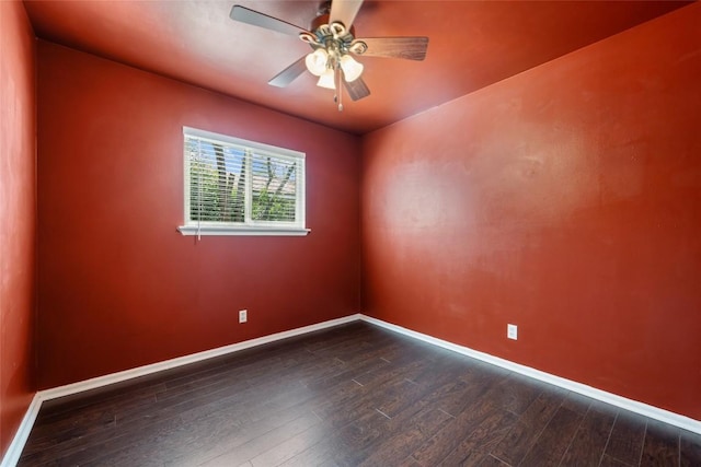 8313 Renton Dr, Austin, TX 78757 - spare room featuring a ceiling fan, baseboards, and dark wood finished floors