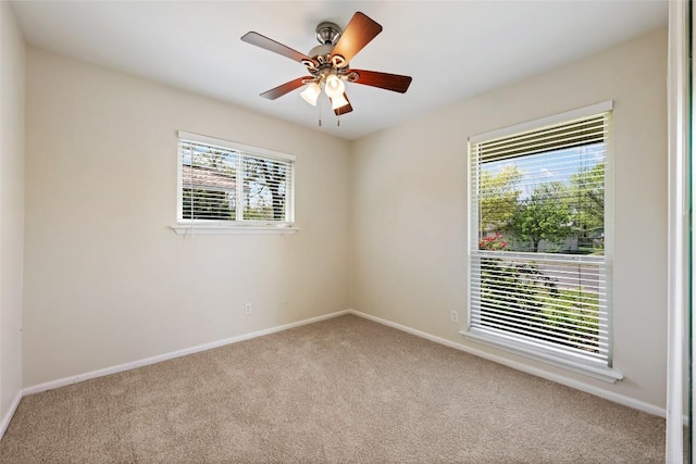 8313 Renton Dr, Austin, TX 78757 - carpeted empty room with baseboards and ceiling fan