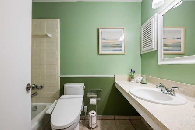 8313 Renton Dr, Austin, TX 78757 - full bath featuring vanity, shower / bathing tub combination, tile patterned floors, and toilet
