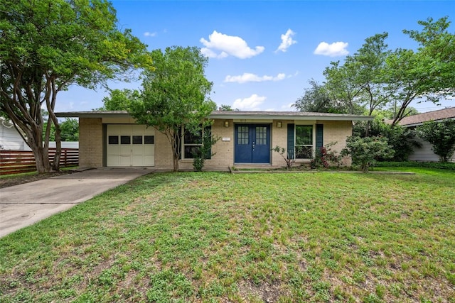 8313 Renton Dr, Austin, TX 78757 - ranch-style house featuring fence, an attached garage, brick siding, a front yard, and driveway