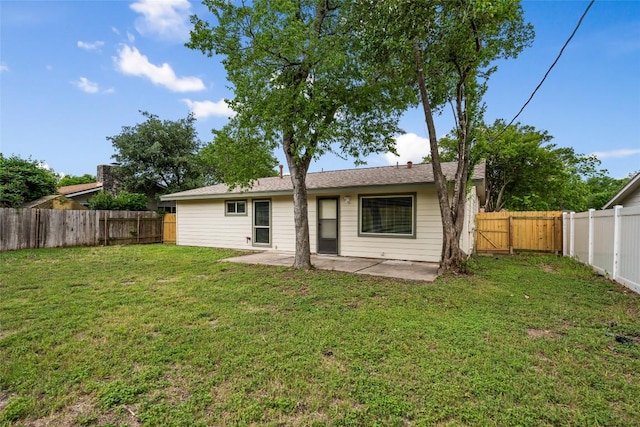 8313 Renton Dr, Austin, TX 78757 - rear view of house featuring a fenced backyard, a patio, and a lawn
