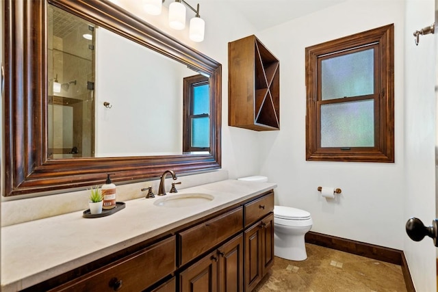 11 Hightrail Way, Austin, TX 78738 - bathroom featuring vanity, baseboards, a shower with shower door, and toilet