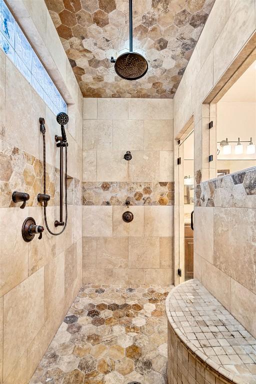 11 Hightrail Way, Austin, TX 78738 - bathroom featuring a tile shower