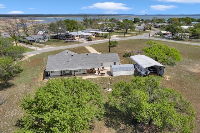 707 Golden Beach Dr, Buchanan Dam, TX 78609 - aerial view of property and surrounding area with a nearby body of water