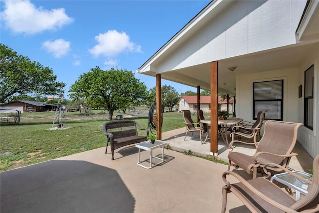 707 Golden Beach Dr, Buchanan Dam, TX 78609 - view of patio featuring outdoor dining area