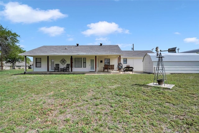 707 Golden Beach Dr, Buchanan Dam, TX 78609 - rear view of property featuring a lawn, a patio area, and stucco siding