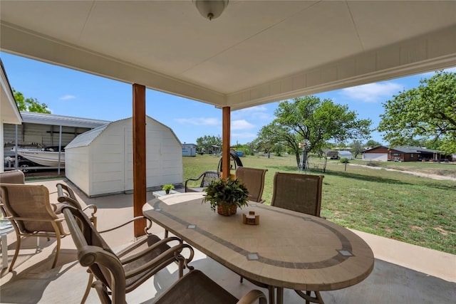 707 Golden Beach Dr, Buchanan Dam, TX 78609 - view of patio featuring outdoor dining area