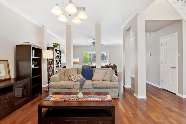 10406 Charette Cv, Austin, TX 78759 - living room featuring wood finished floors, ornamental molding, baseboards, a ceiling fan, and a chandelier