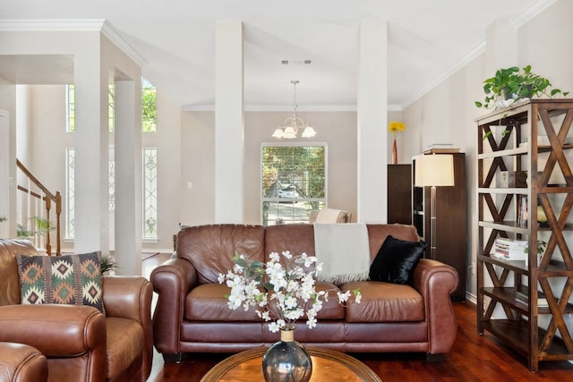 10406 Charette Cv, Austin, TX 78759 - living area featuring dark wood-style floors, a chandelier, plenty of natural light, and ornamental molding