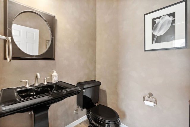 10406 Charette Cv, Austin, TX 78759 - half bathroom with toilet and baseboards