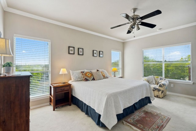 10406 Charette Cv, Austin, TX 78759 - bedroom featuring baseboards, light colored carpet, multiple windows, crown molding, and a ceiling fan