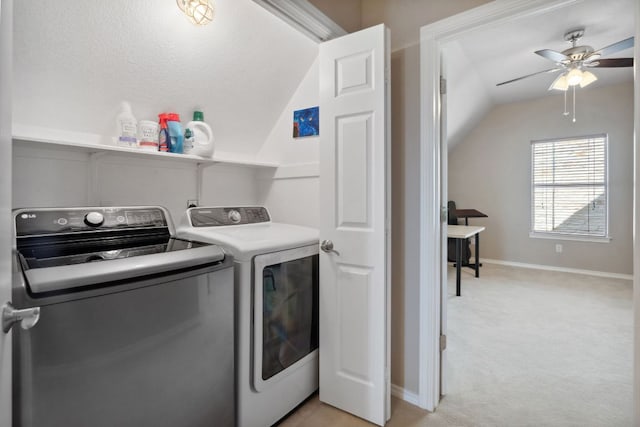 10406 Charette Cv, Austin, TX 78759 - washroom featuring washing machine and dryer, ceiling fan, light carpet, and baseboards