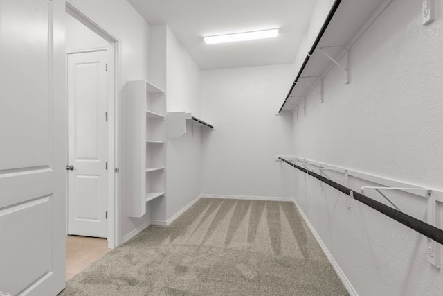 1800 Sauterne Dr, Leander, TX 78641 - walk in closet with carpet flooring