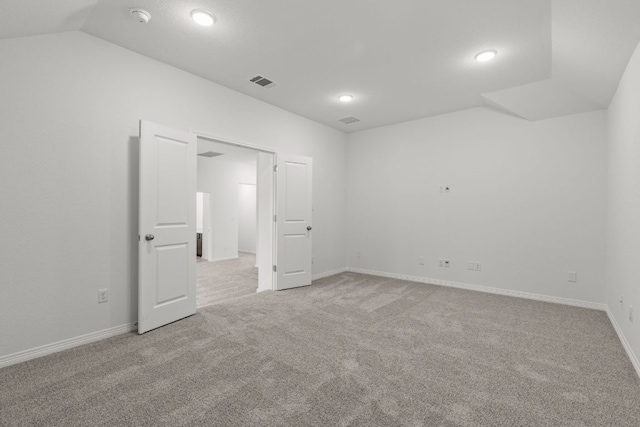 1800 Sauterne Dr, Leander, TX 78641 - unfurnished bedroom featuring carpet, lofted ceiling, and recessed lighting