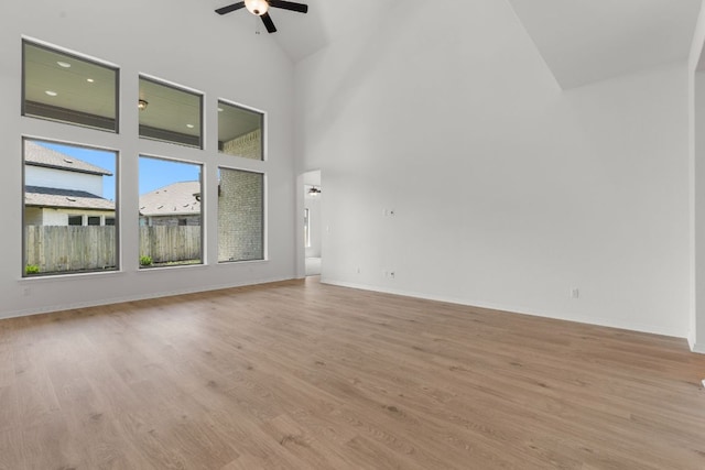 1800 Sauterne Dr, Leander, TX 78641 - spare room with a ceiling fan, high vaulted ceiling, and light wood-style flooring