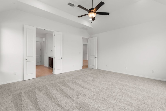 1800 Sauterne Dr, Leander, TX 78641 - unfurnished bedroom featuring vaulted ceiling, light carpet, and a ceiling fan