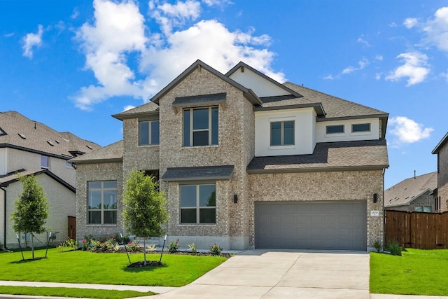 1800 Sauterne Dr, Leander, TX 78641 - view of front of property with a garage, concrete driveway, brick siding, and a shingled roof