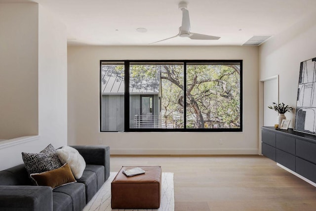1202 Fieldcrest Dr, Austin, TX 78704 - living room with light wood-style floors and a ceiling fan