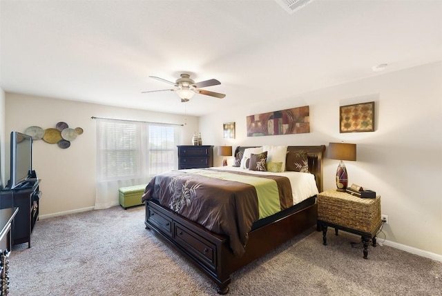 598 Sweet Gum Dr, Kyle, TX 78640 - bedroom featuring light colored carpet, a ceiling fan, and baseboards