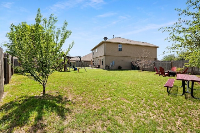 598 Sweet Gum Dr, Kyle, TX 78640 - view of yard featuring a playground