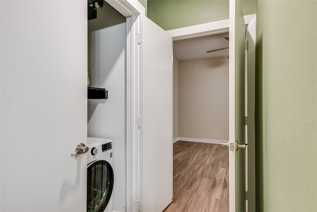 1900 Barton Springs Rd Unit 1009, Austin, TX 78704 - laundry area featuring washer / dryer and wood finished floors